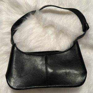 Black purse. No manufacture tag.